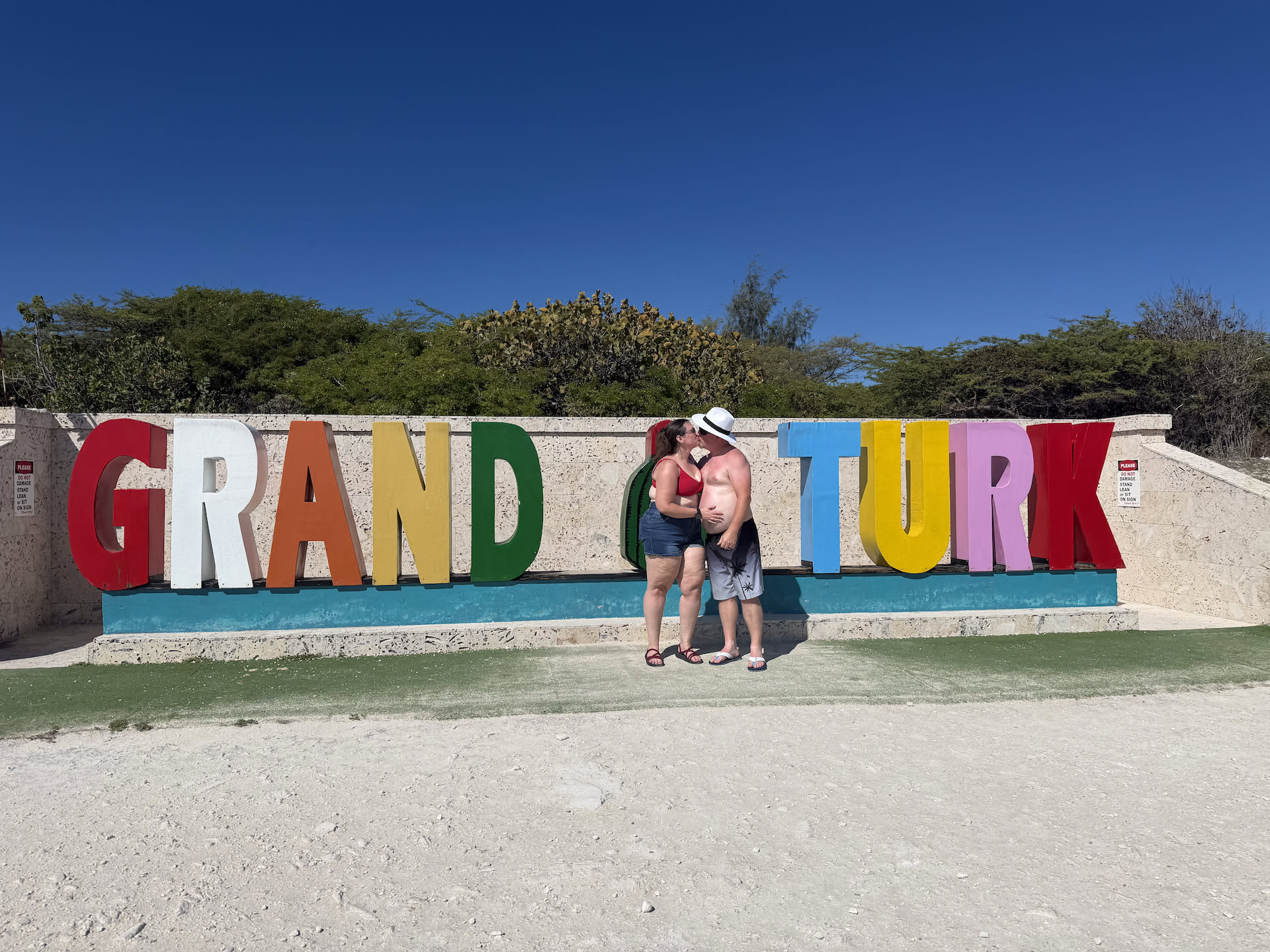 A little smooch in front of the Grand Turk sign.