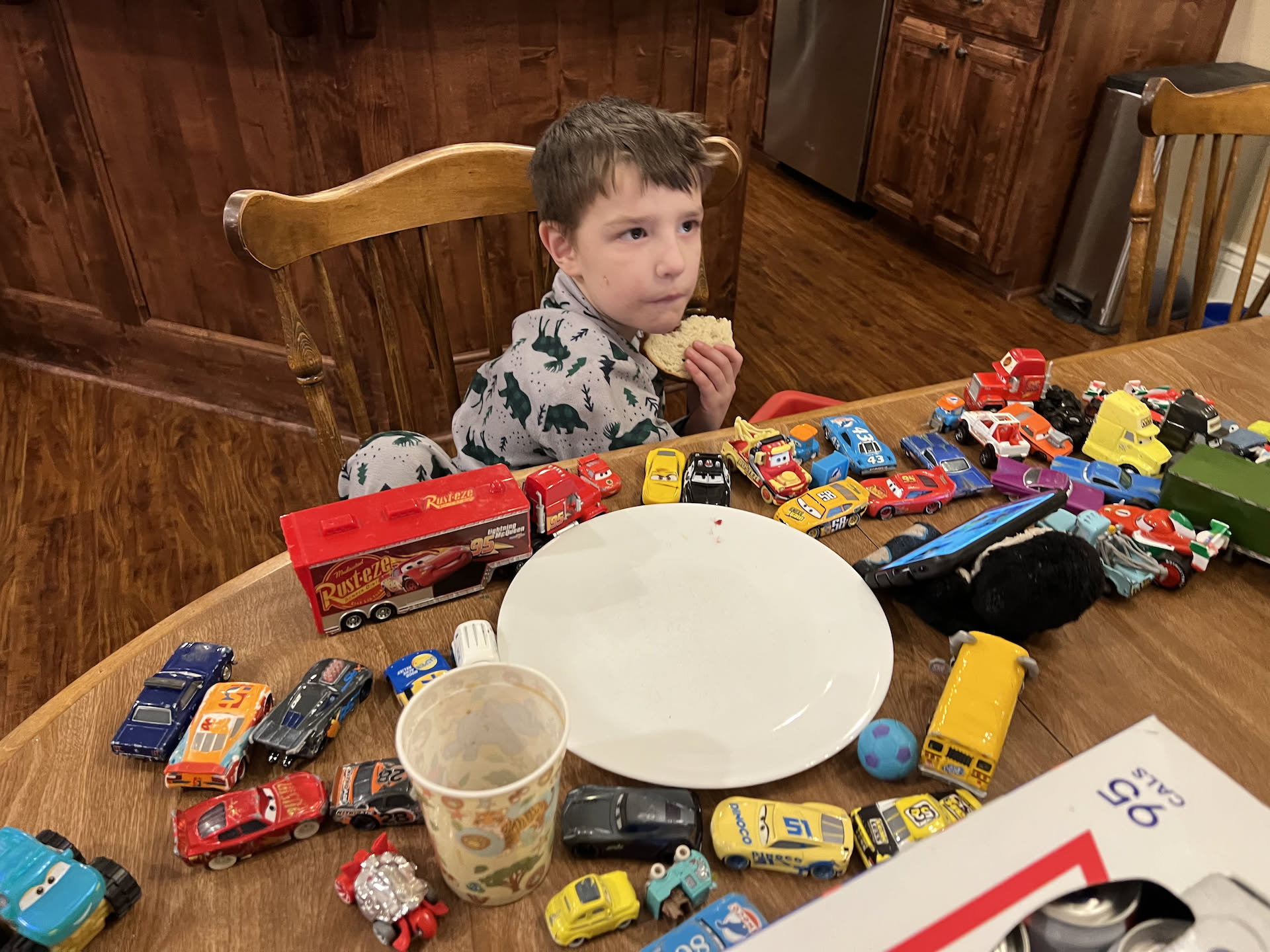 Axel showing us all of his “Cars” cars… um ya Nick played with them.