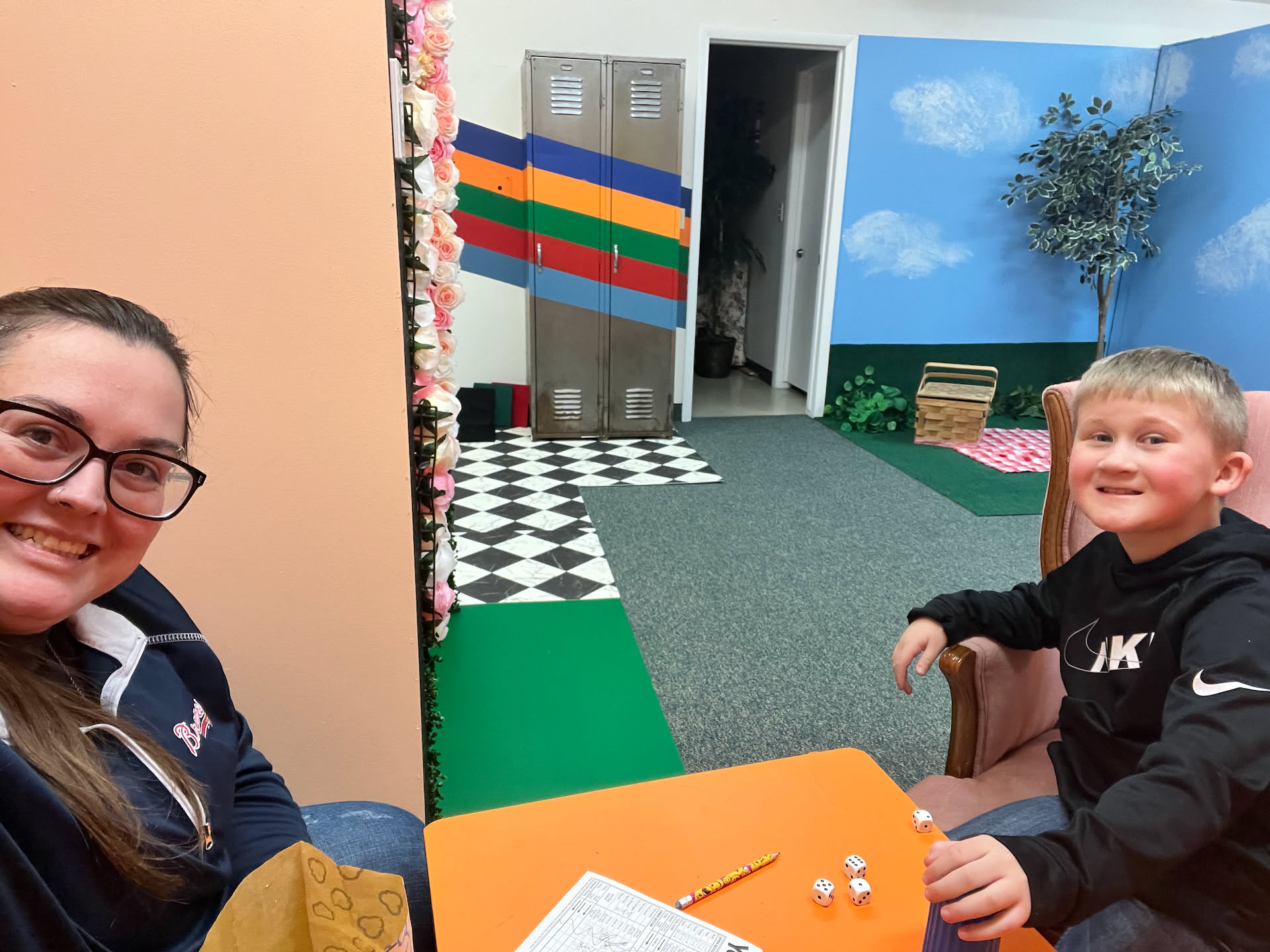 Hanging out at Pix… Ethan and Deanna played a game of Yahtzee while waiting on customers.