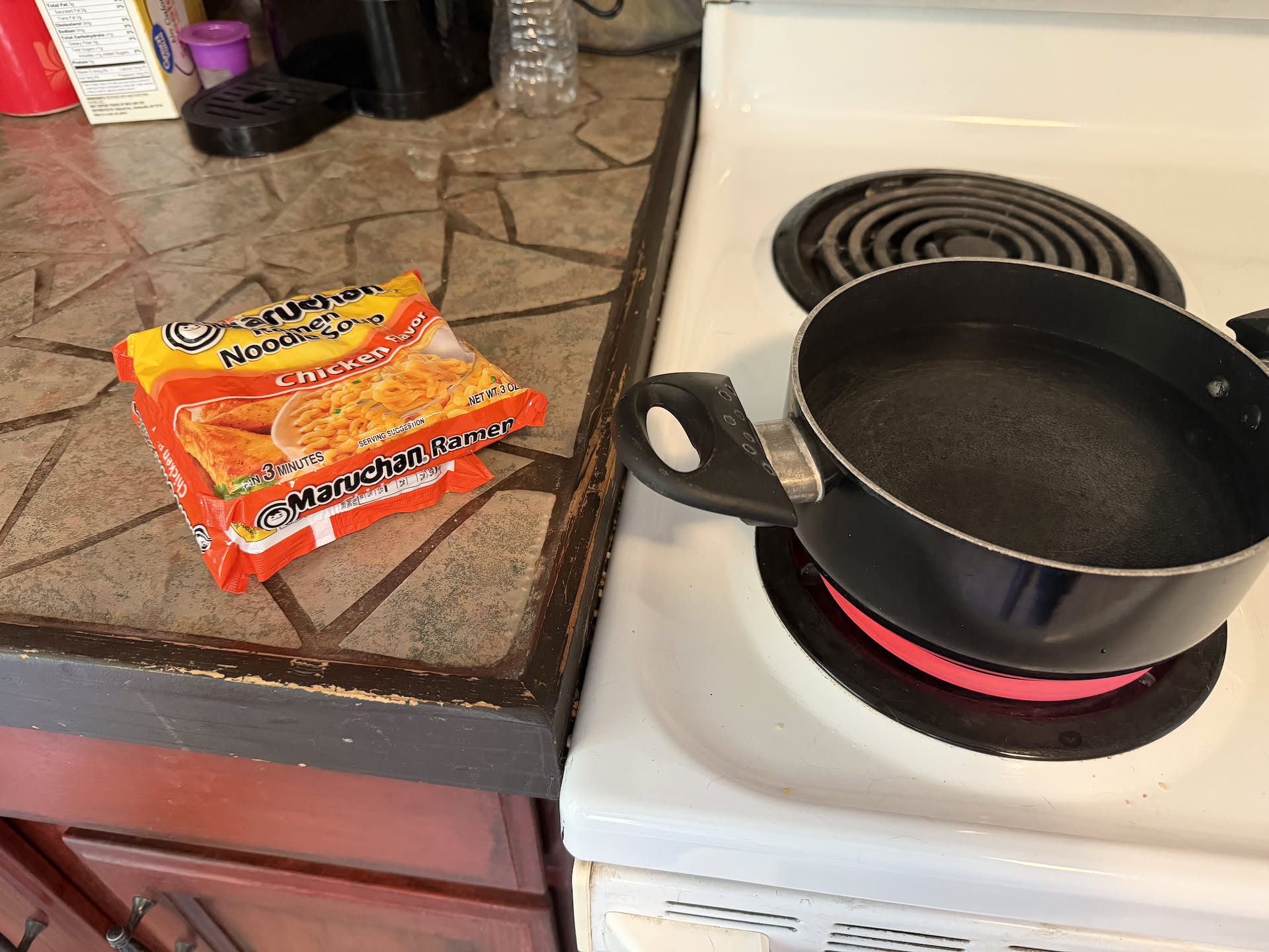 Making me some quick food that will be easy on my stomach for the trip.