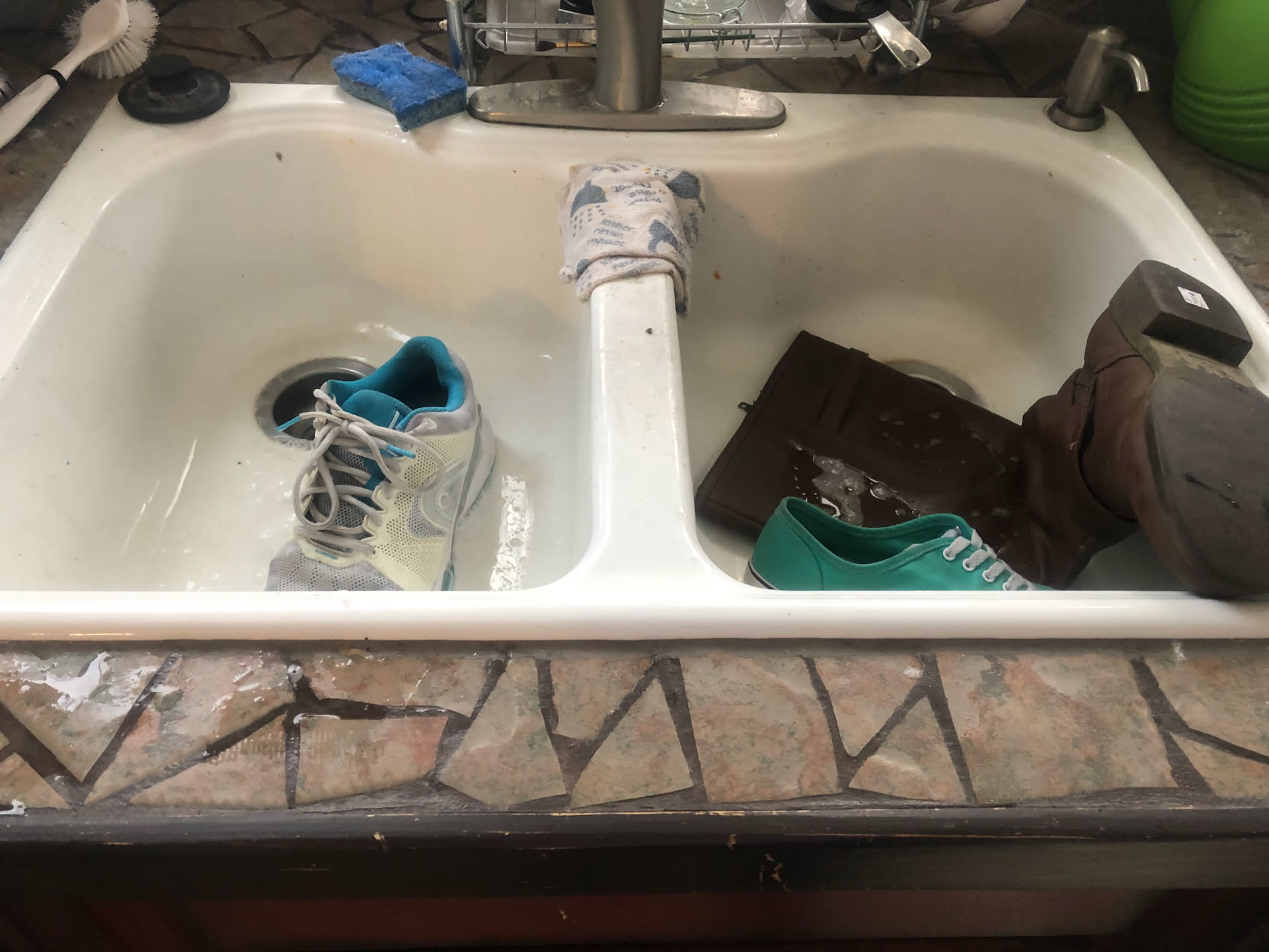 While Nick and Avery were outside, Deanna started hand washing her shoes she dug out of her closet project.