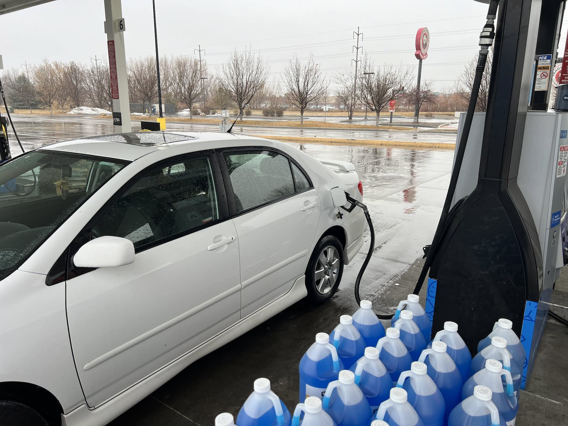First thing in the morning Nick had to stop for gas because he has been driving with the gas light on for 3 days… of course it would be a rainy/snowy morning.
