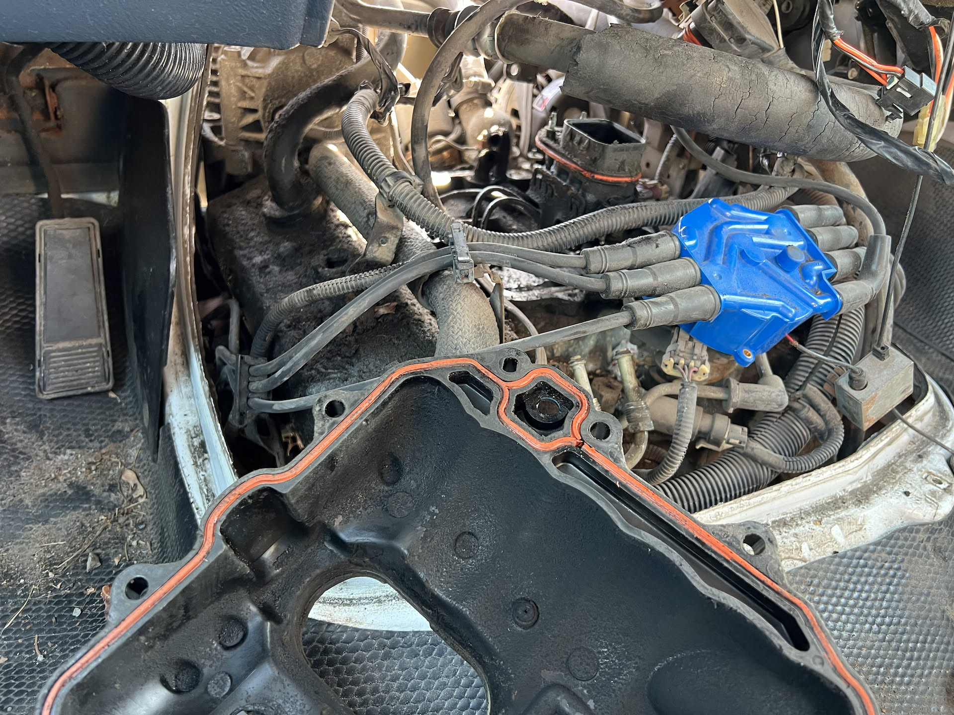 It took all afternoon, but Nick finally got the top of the engine off to gain access to the Spider Injectors. its hard to tell, but this picture is from inside the cab.. so hard to work on.