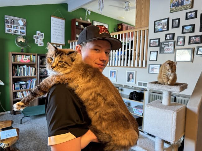 When we got home to change and drop Avery off, we got a pic of him with Maynard.