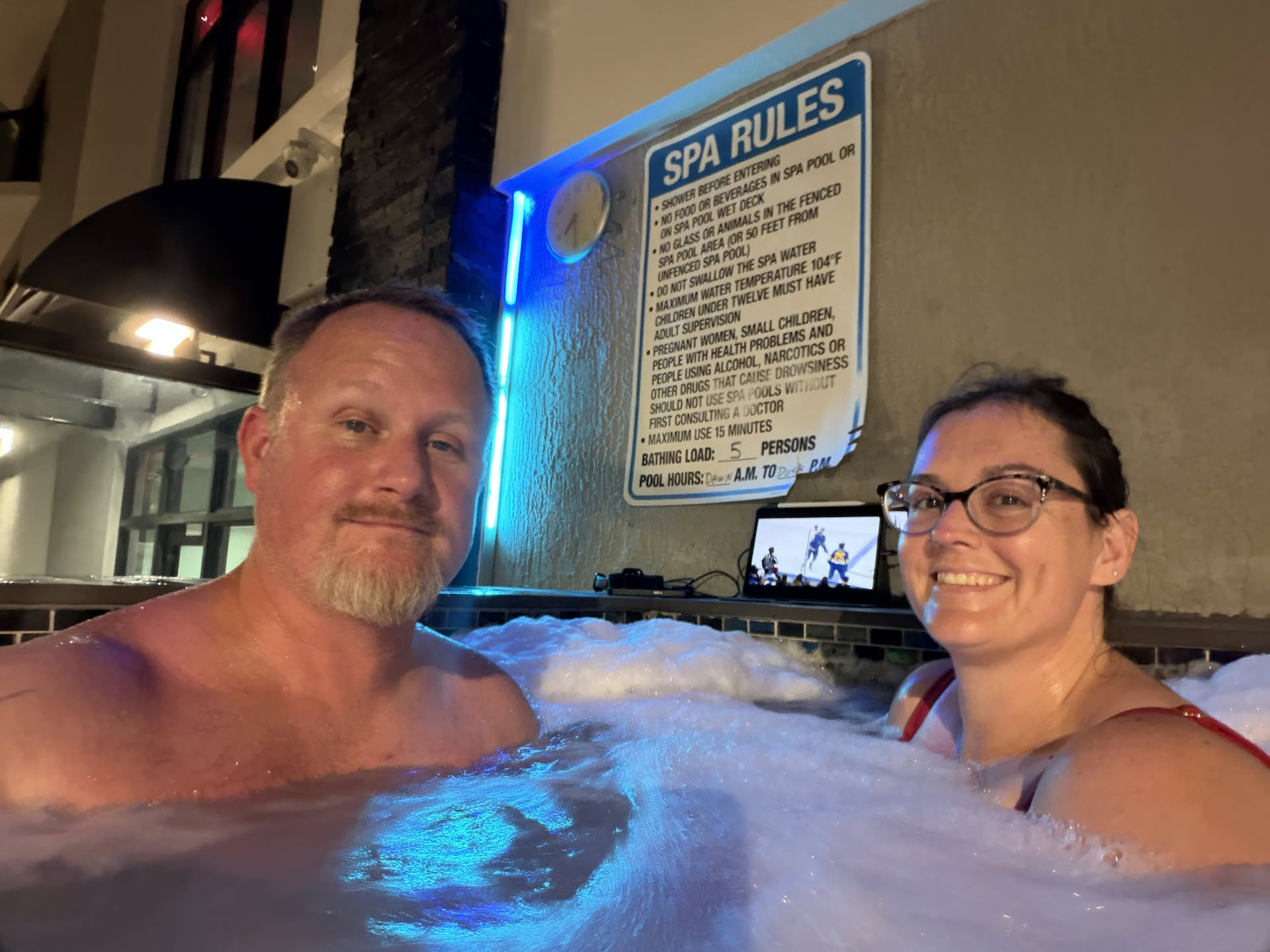 Deanna’s hockey game started so we decided to watch it in the hot tub.