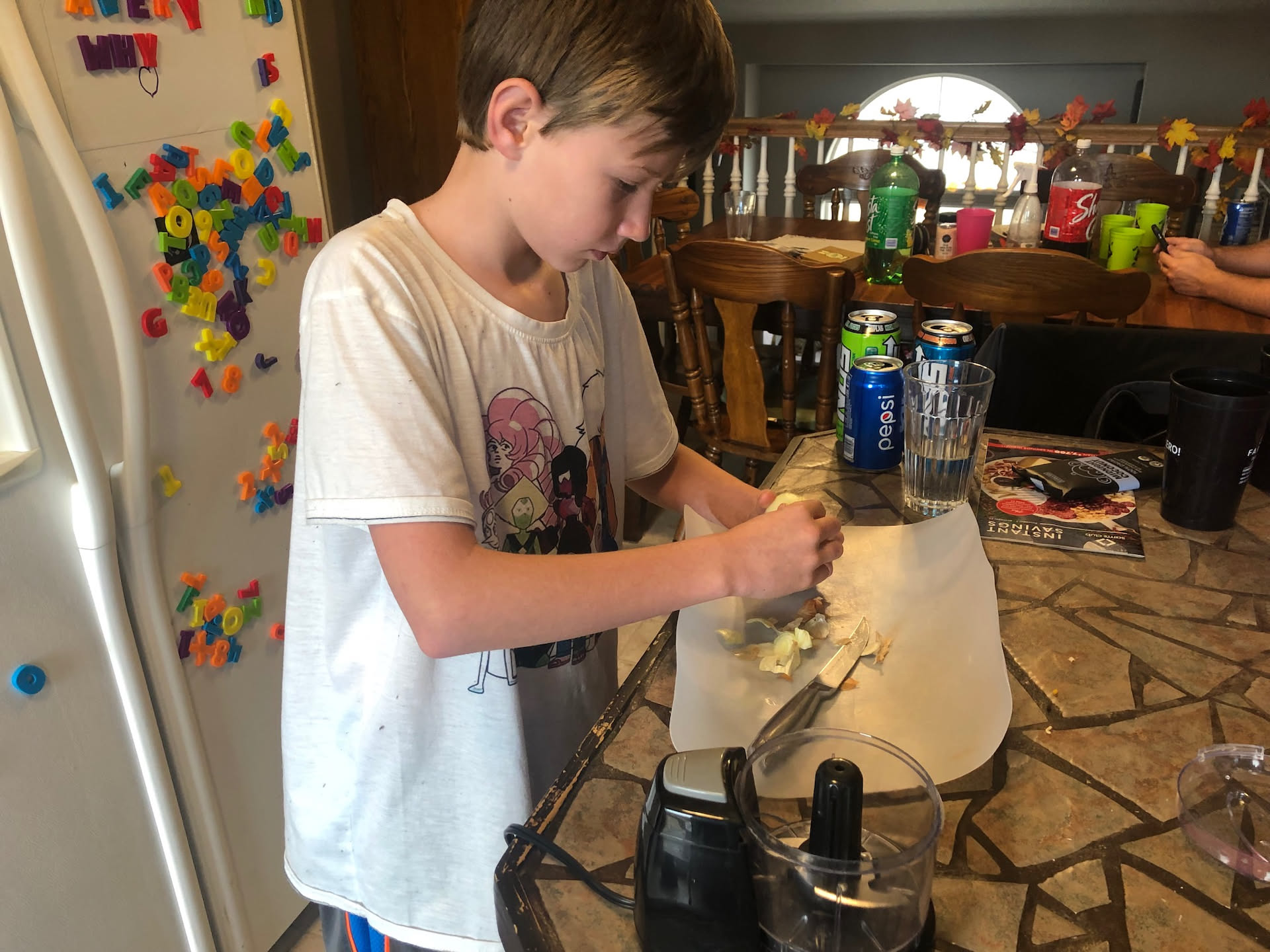 Avery helping mom with the big dinner.