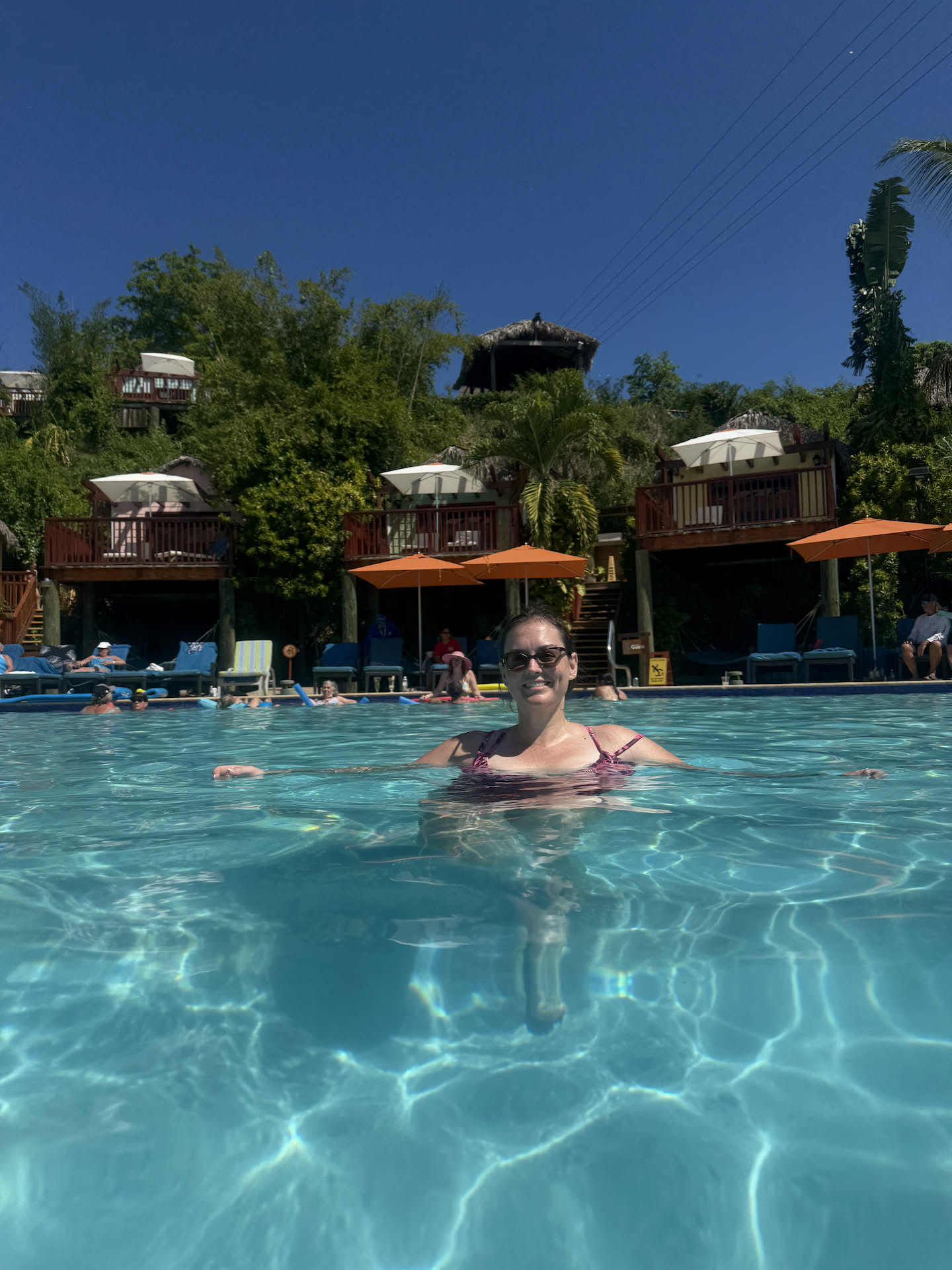 Deanna enjoying the pool and that perfect blue sky.