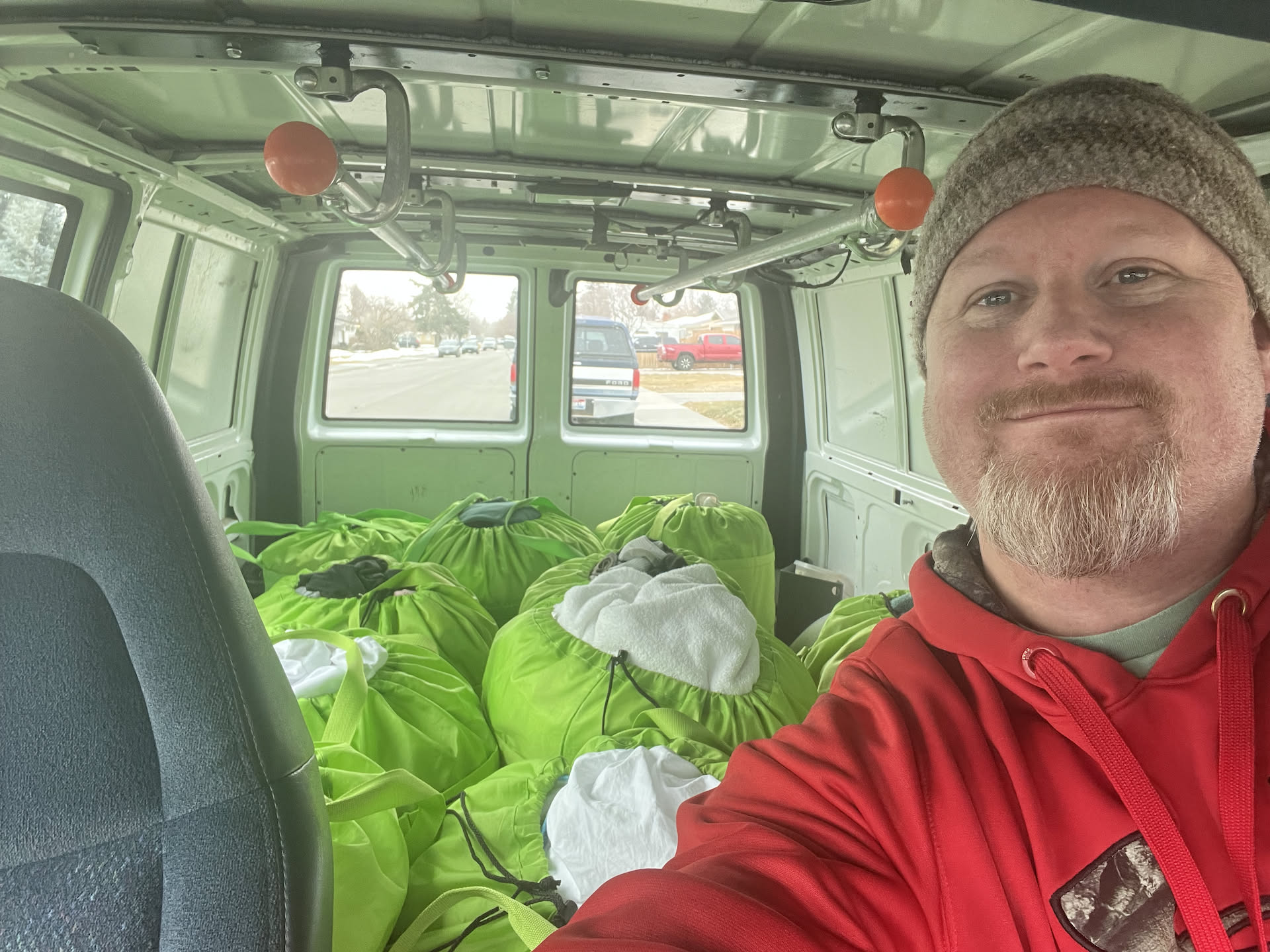 Starting the day off busy… look at all the green totes Nick picked up today!