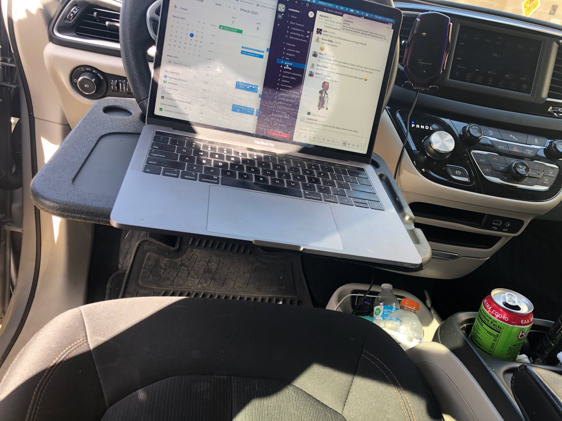 While waiting for Ethan, Nick got to use one of his Birthday gifts. Its a tray that hooks on to the steering wheel and his laptop fits nicely so he can work while he waits.