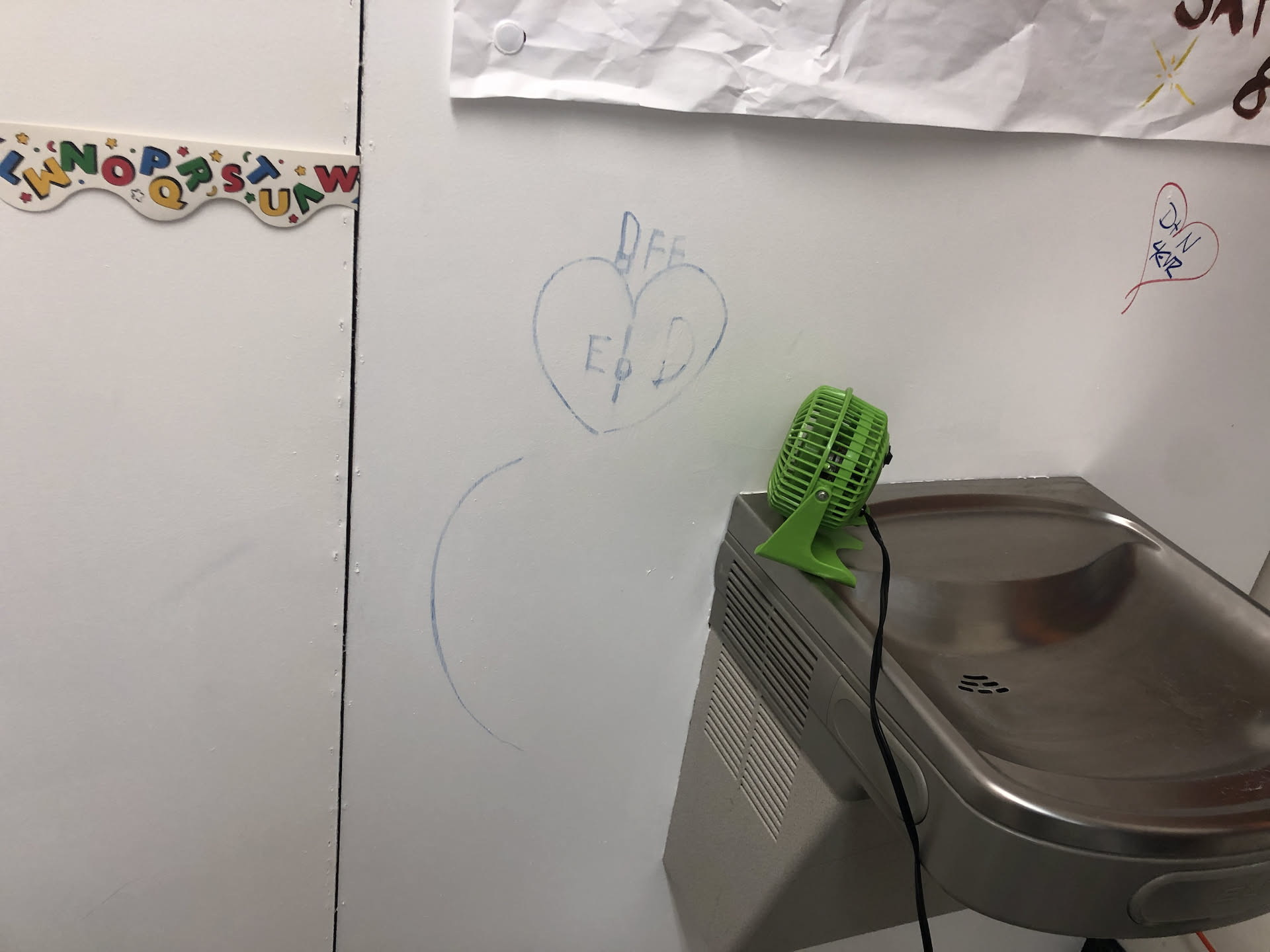 When we had mom and dad watch Pix for us one night, mom let Ethan draw on one of our booths with a permanent marker, so this is the first coat of white paint trying to cover it up.