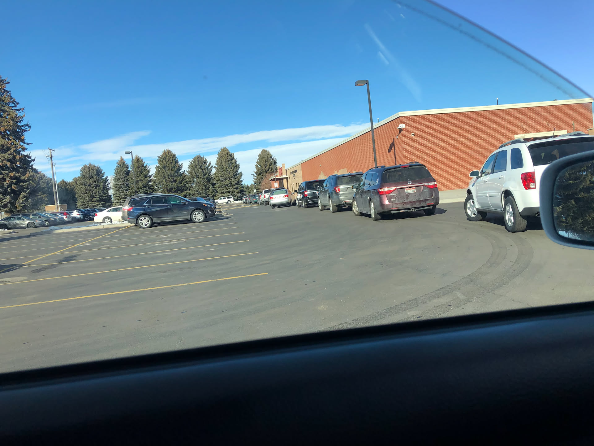 Waiting in line to pick up Ethan from school.