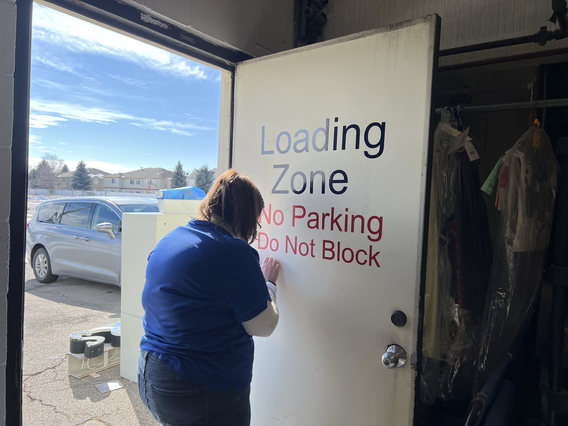 The neighboring business had a tournament today, and their customers parked and blocked our back door, so we decided to put some vinyl up on the door as well.