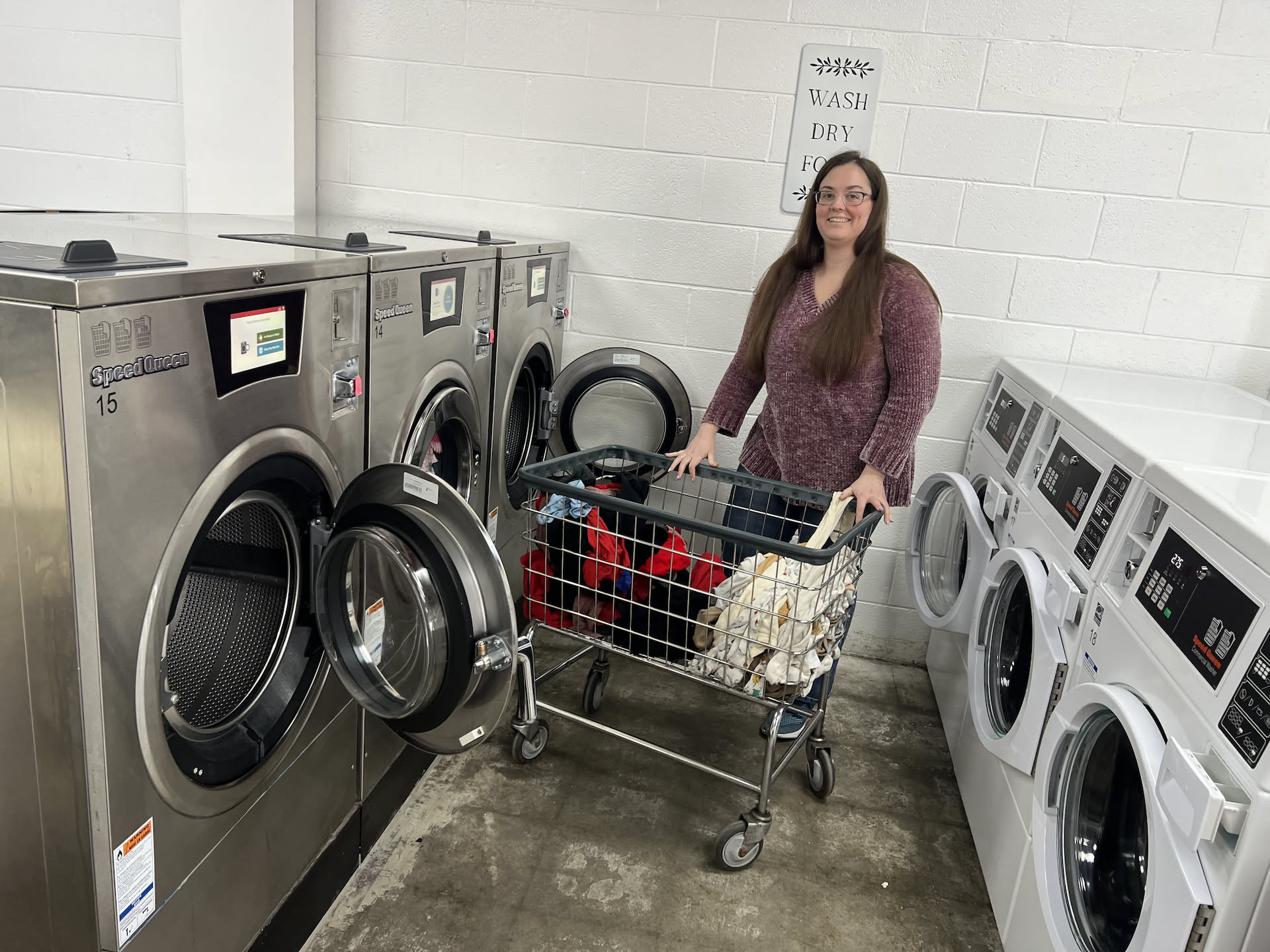Since Nick got kicked out, he went and spent time with Deanna at the laundromat… another wash and fold order came in, so Deanna was hard at work on that order.