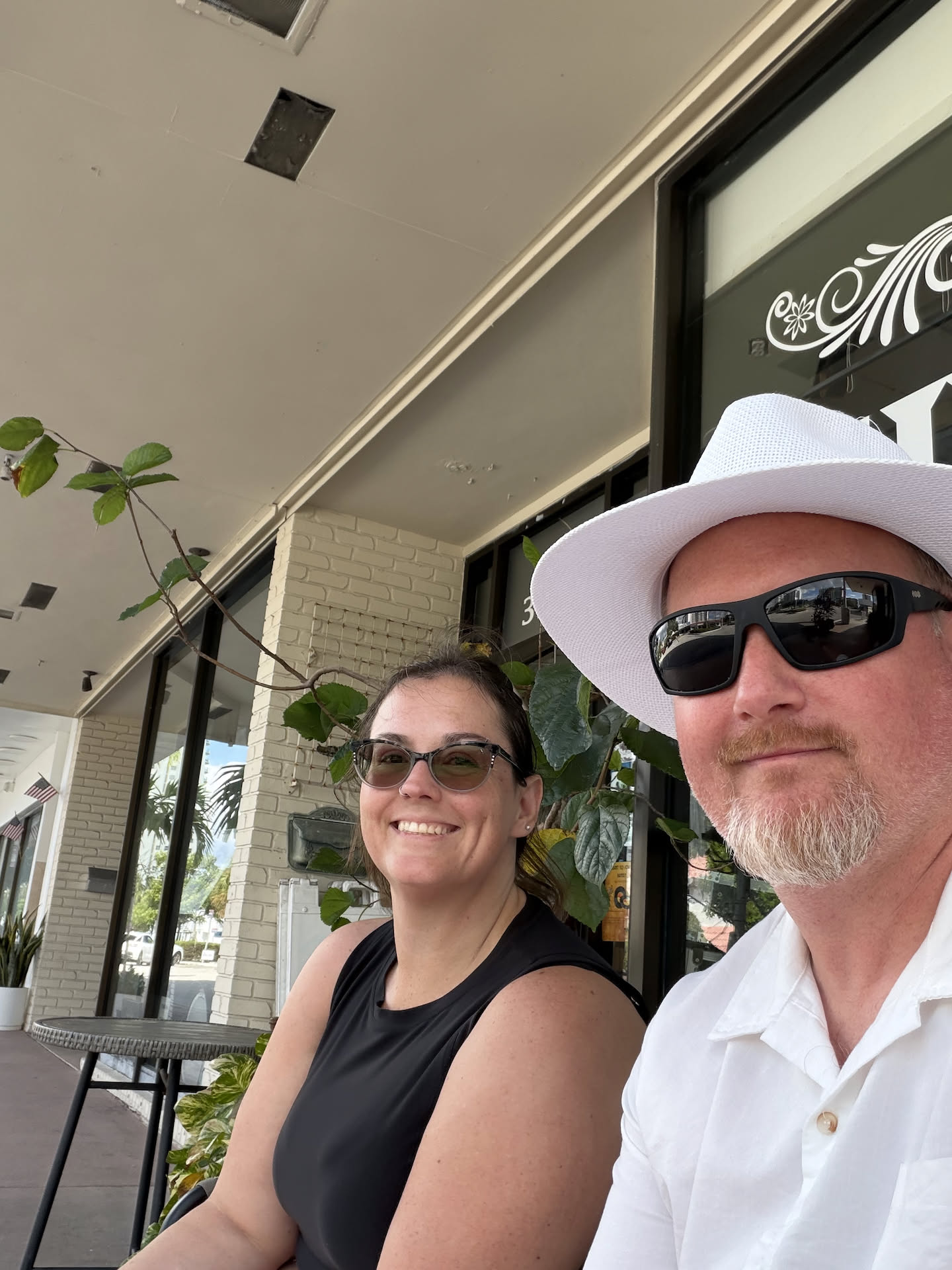 Took a seat outside some random business to see what restaurants were around us.