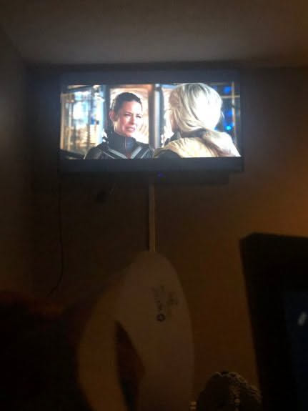 Deanna watching a movie with the kids waiting for me to get home.