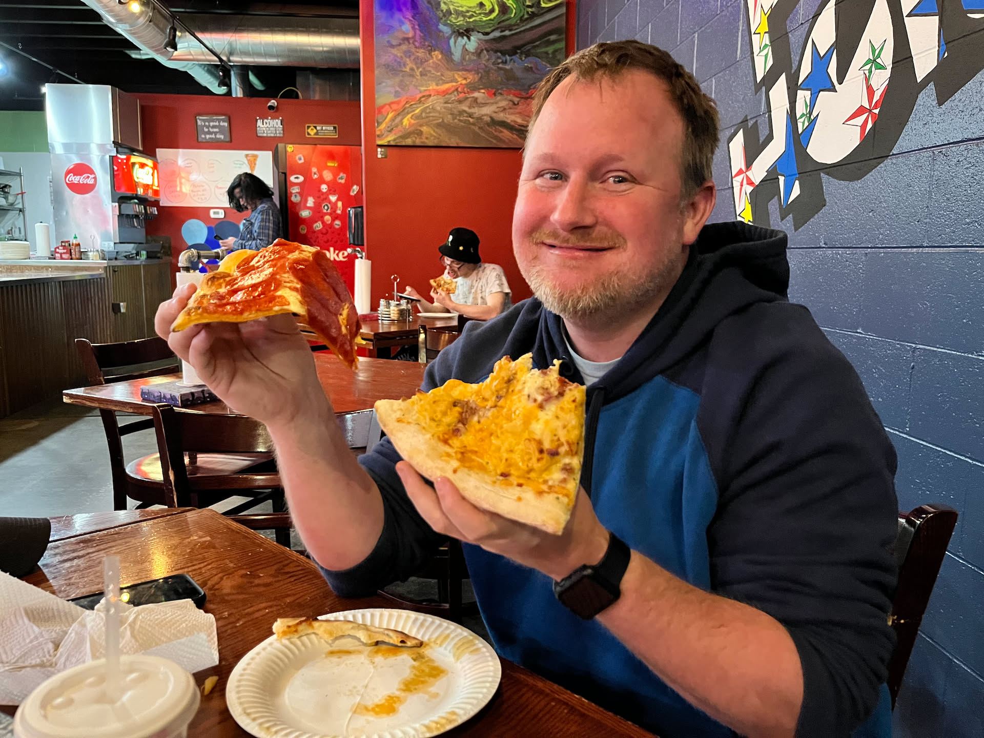 After working at Pix, we treated ourselves to Pie Hole again while we waited for Avery in hockey… Nick is double fisting the pizza lol.