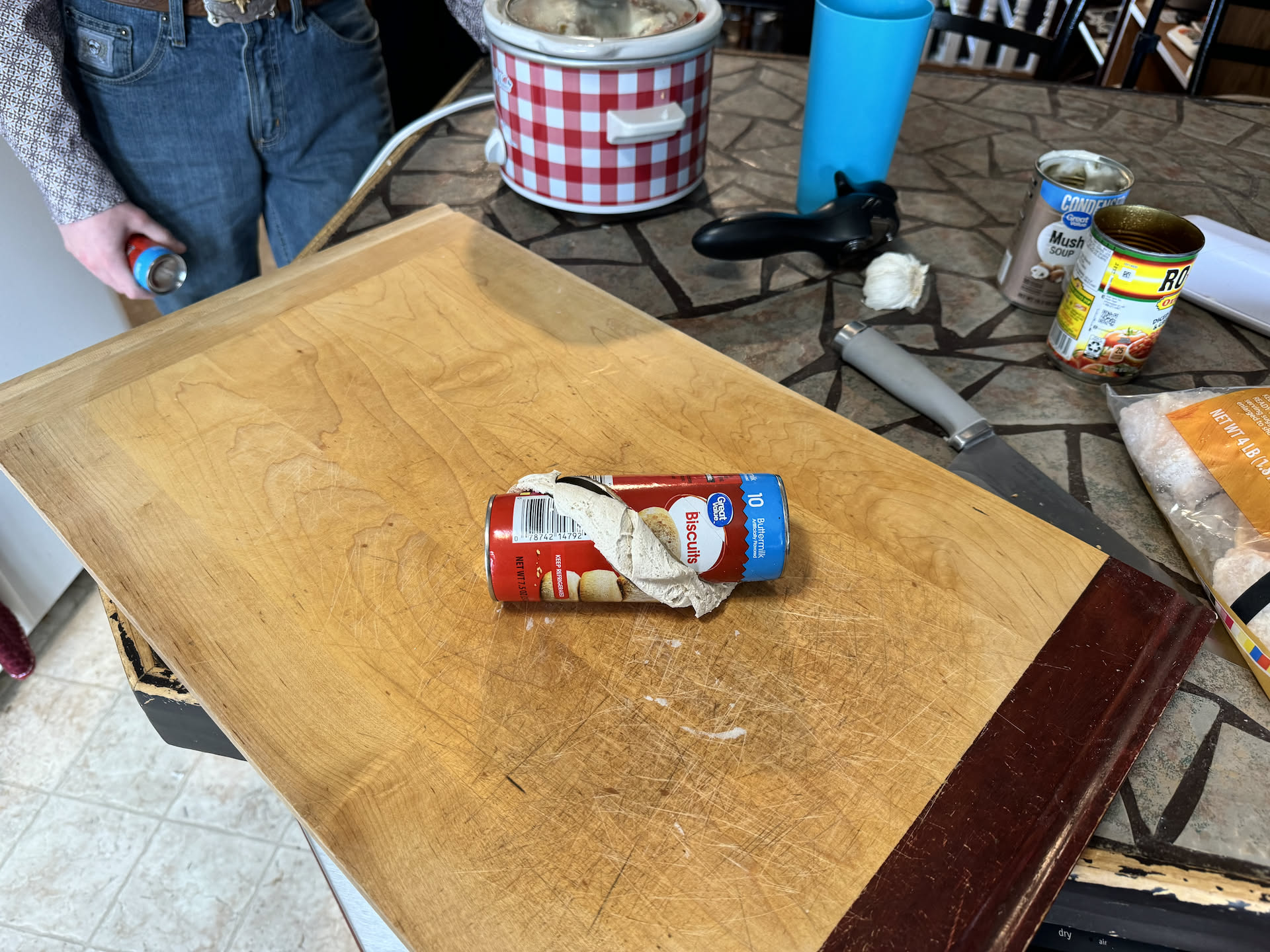 Deanna went home early to cook us all the amazing foods for the game… found one of the biscuits can busted early… it happens.