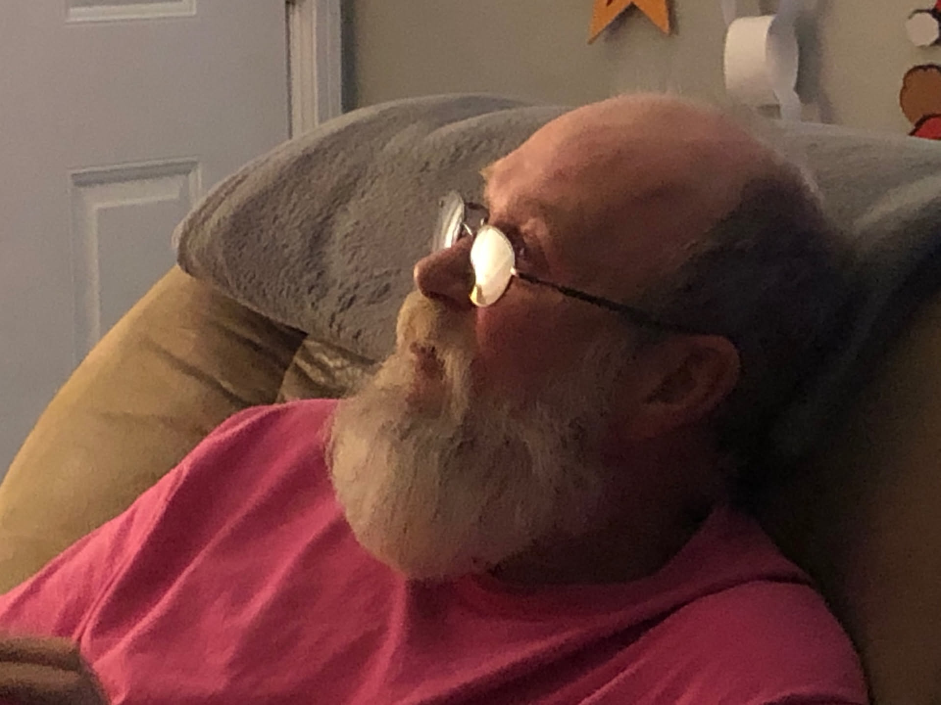 Dad is working on his Santa look.