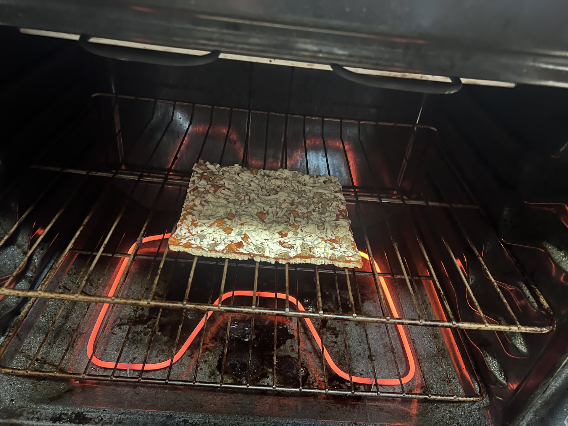 Nick made himself a Totino’s pizza for a snack.