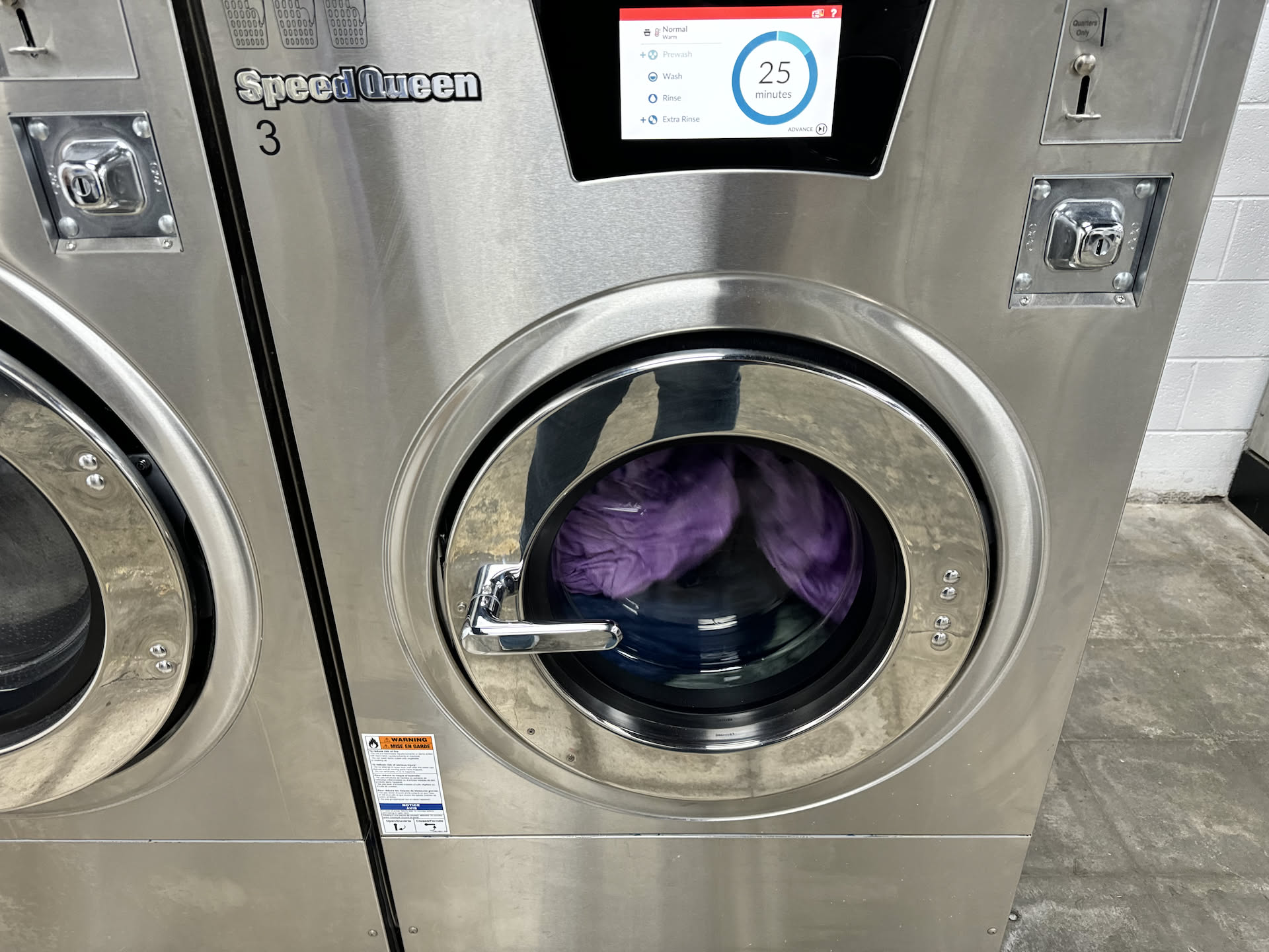Deanna’s turn at the laundromat… a wash and fold order being worked on.