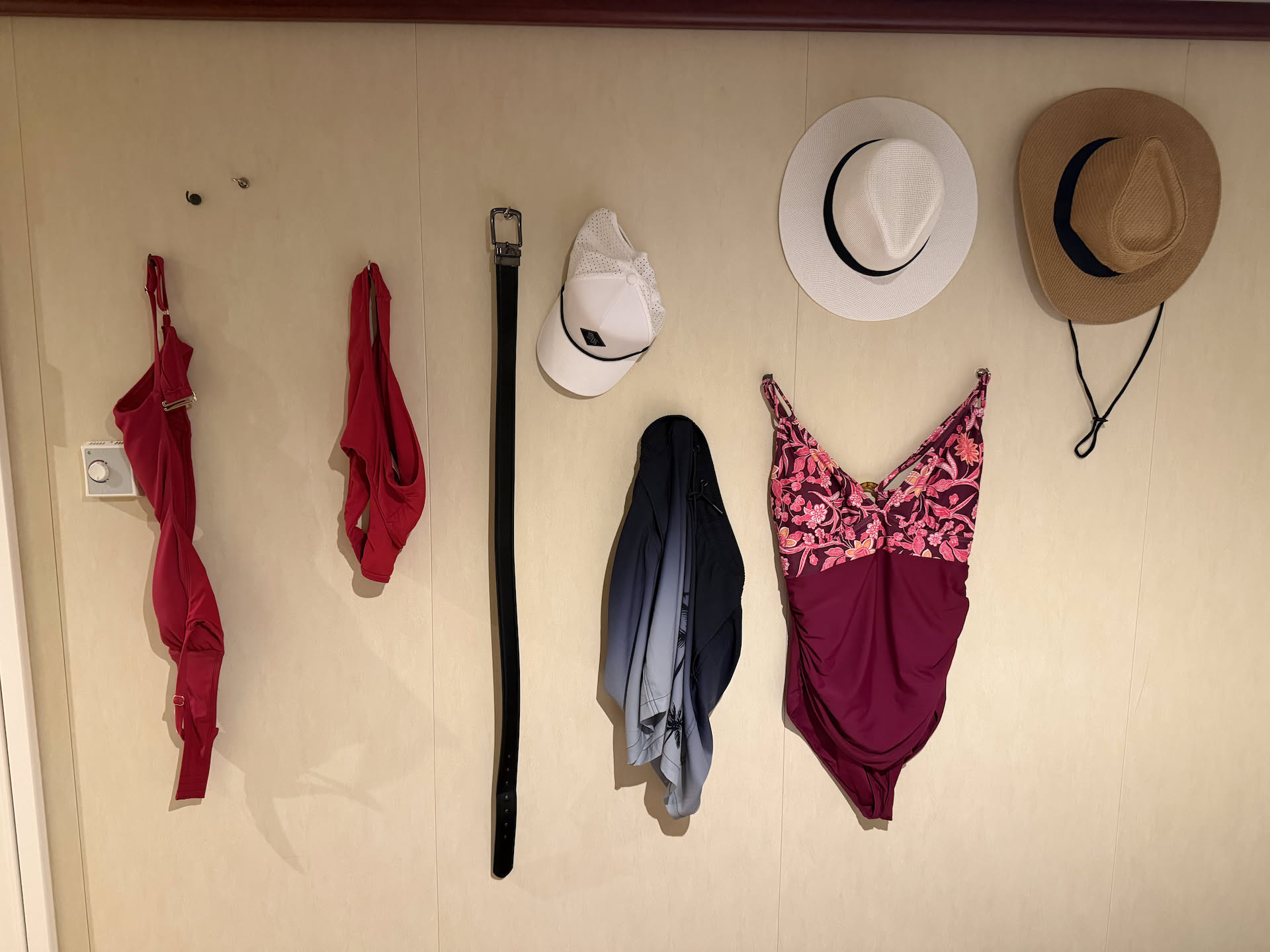 Back on the ship, showering to get the sand off, our wall of things is growing