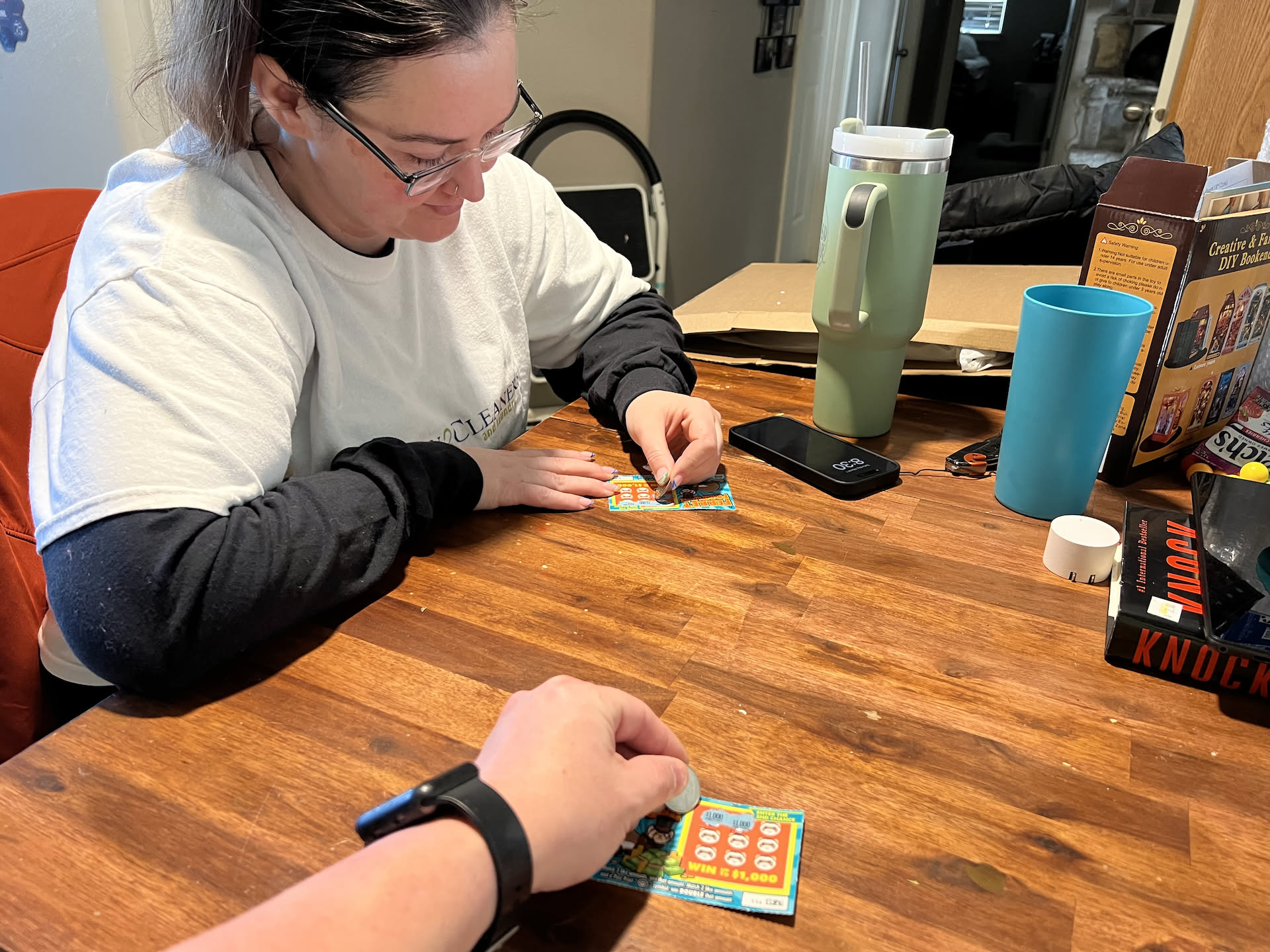 Nick remembered he bought a couple scratchers yesterday. So while we waited for time to go to work, we scratched… Nick won $1 (or got his dollar back, however you want to look at it).