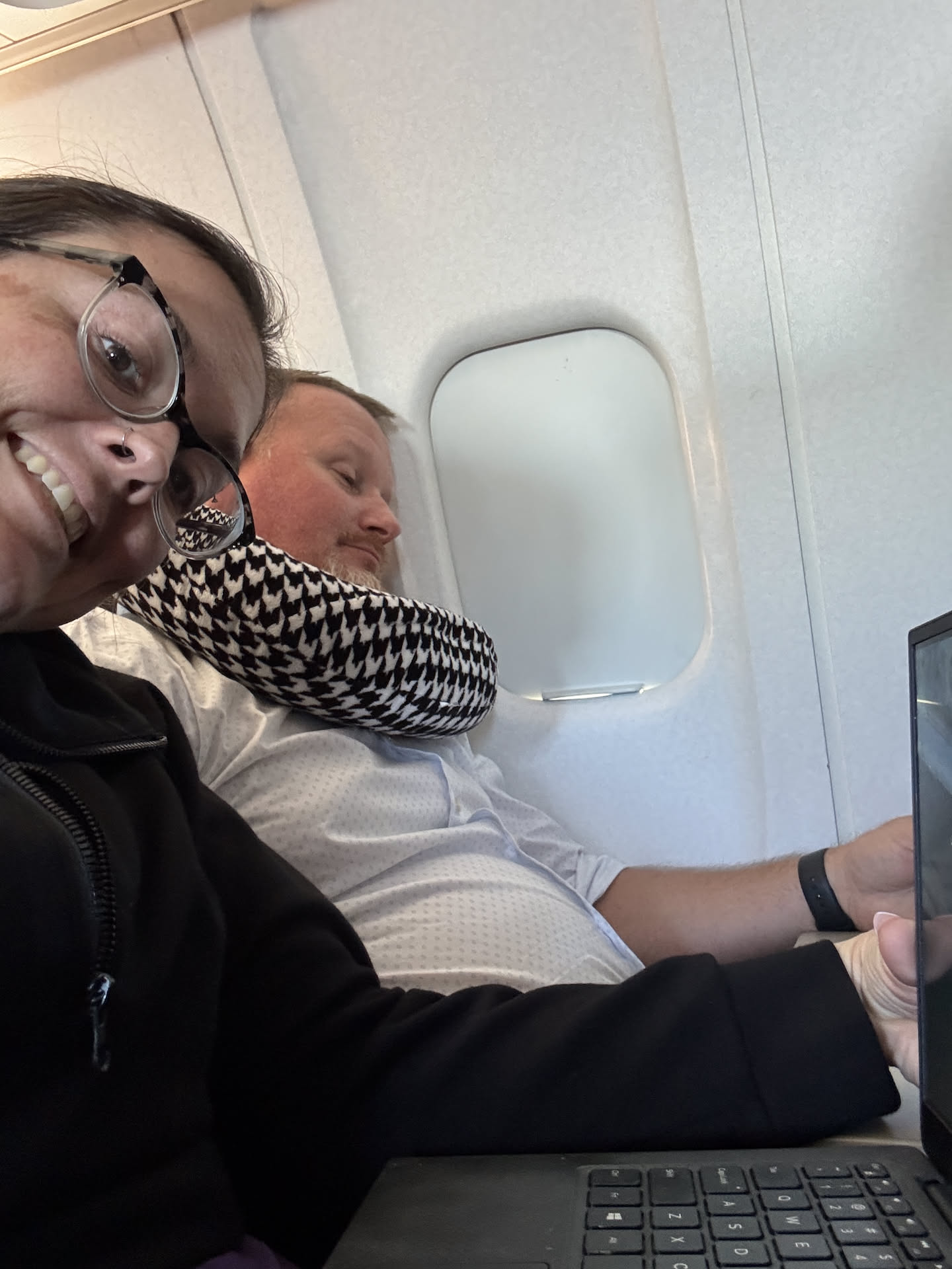 Movies and scrolling the flight away…