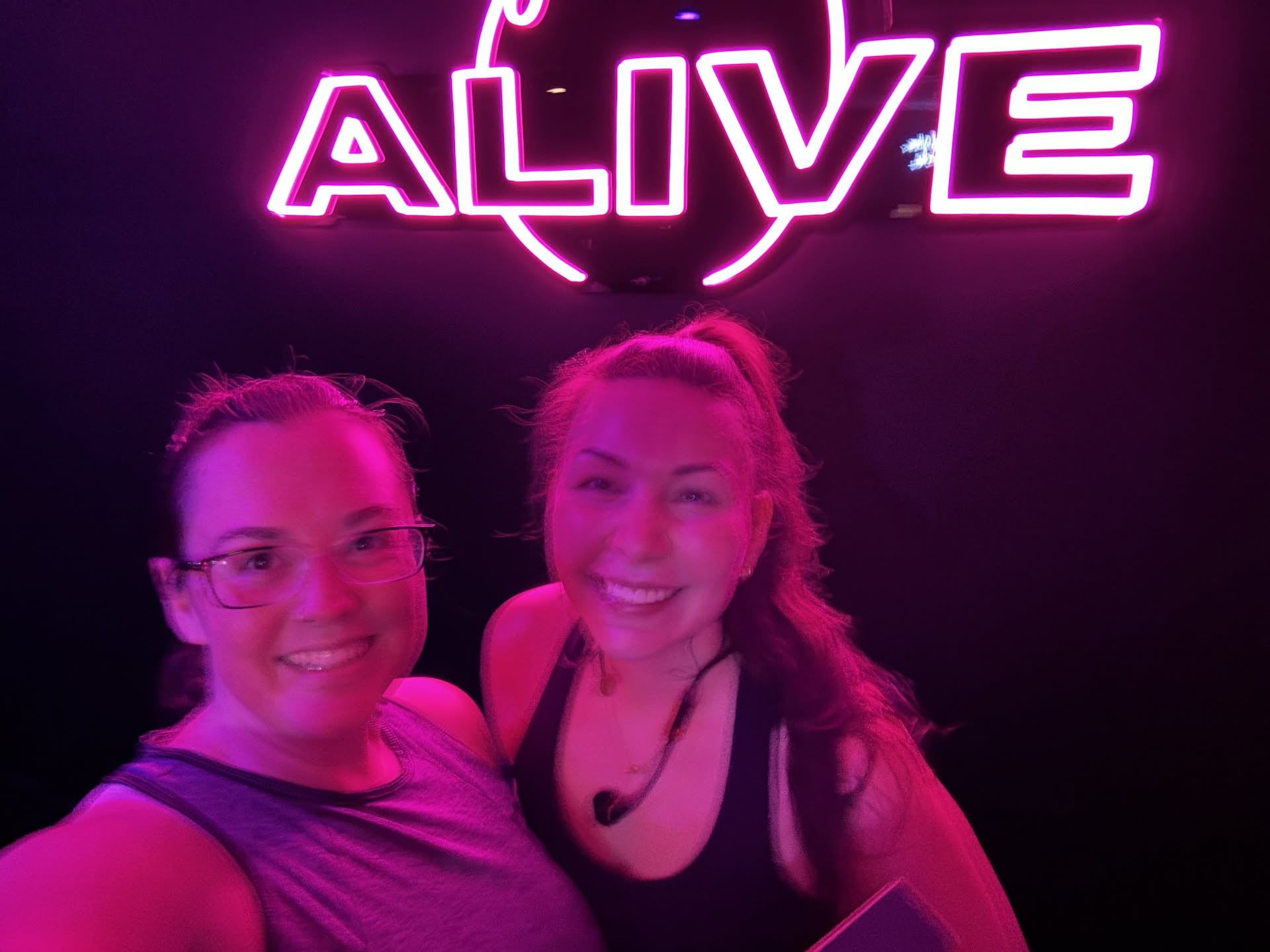 Once she tried it though, she had a blast… here she is with one of the trainers. She said it is blurry because she was so shaky lmao.