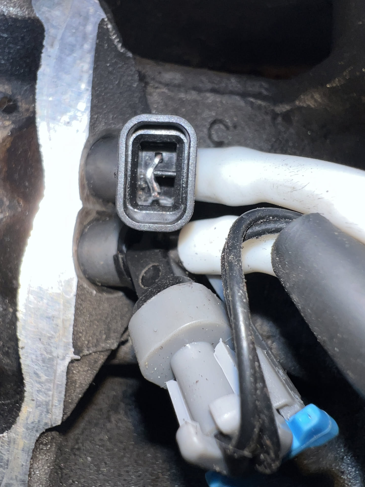 While putting the new injectors in, one of the plugs came unplugged, and when Nick went to plug it back in, he ended up pressing the pins inside over. Nick then had to take the whole thing apart again and realign the pins in hopes to plug it back in and have it work again… wish him luck!