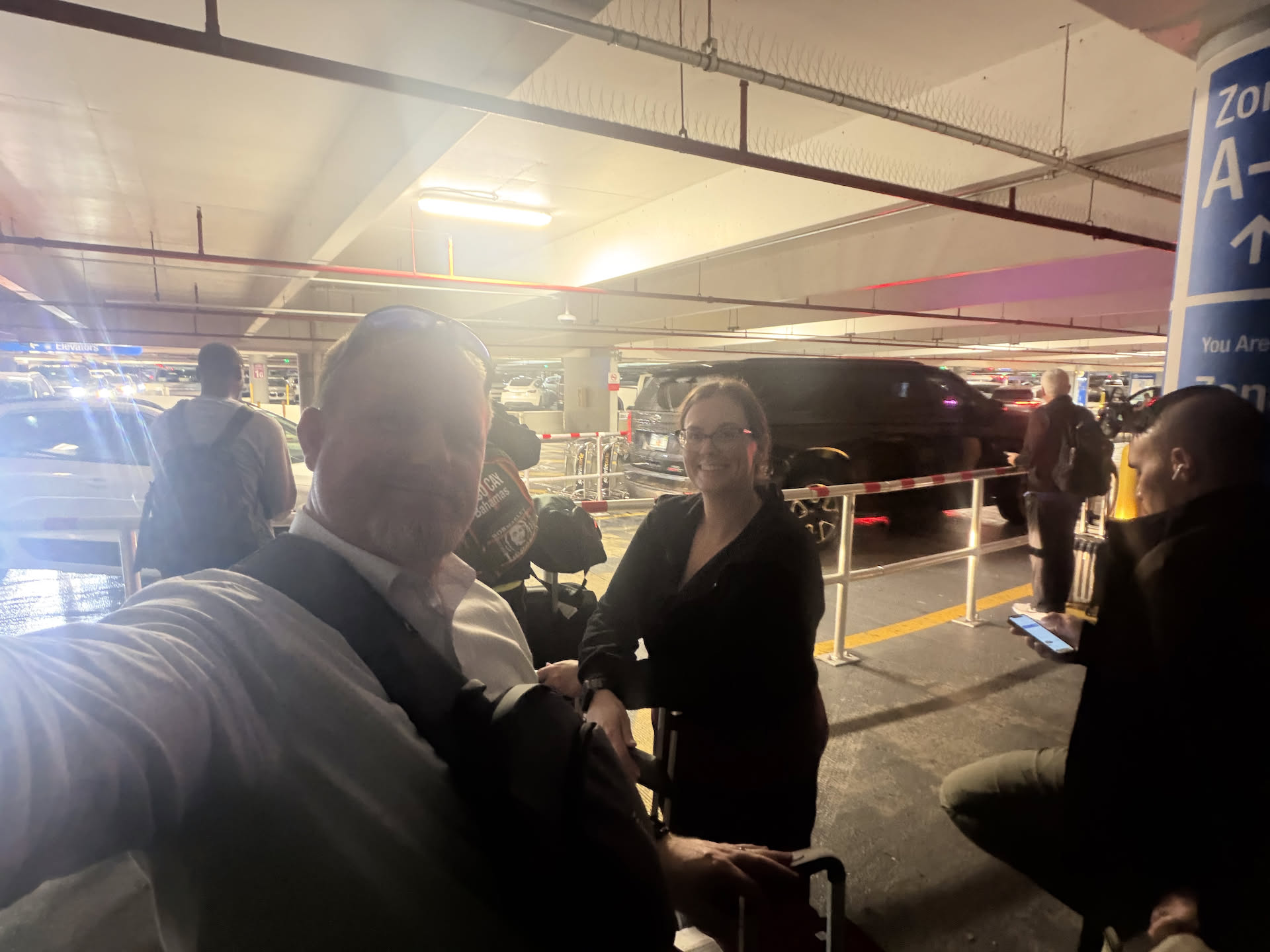 Terrible picture, but our flight just landed, we got our luggage and are waiting for our Uber.