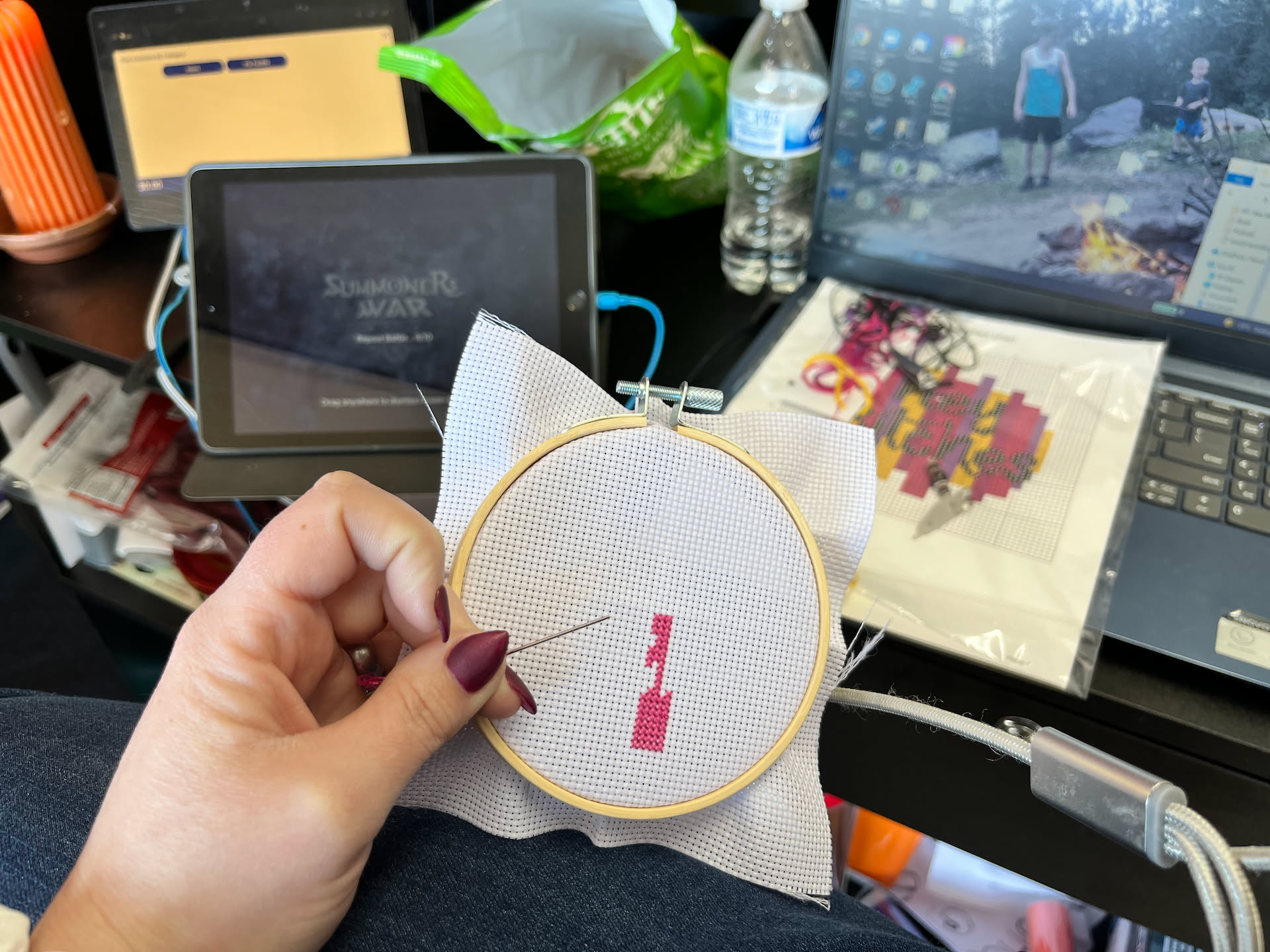 At Pix, Deanna started working on embroidery between customers.