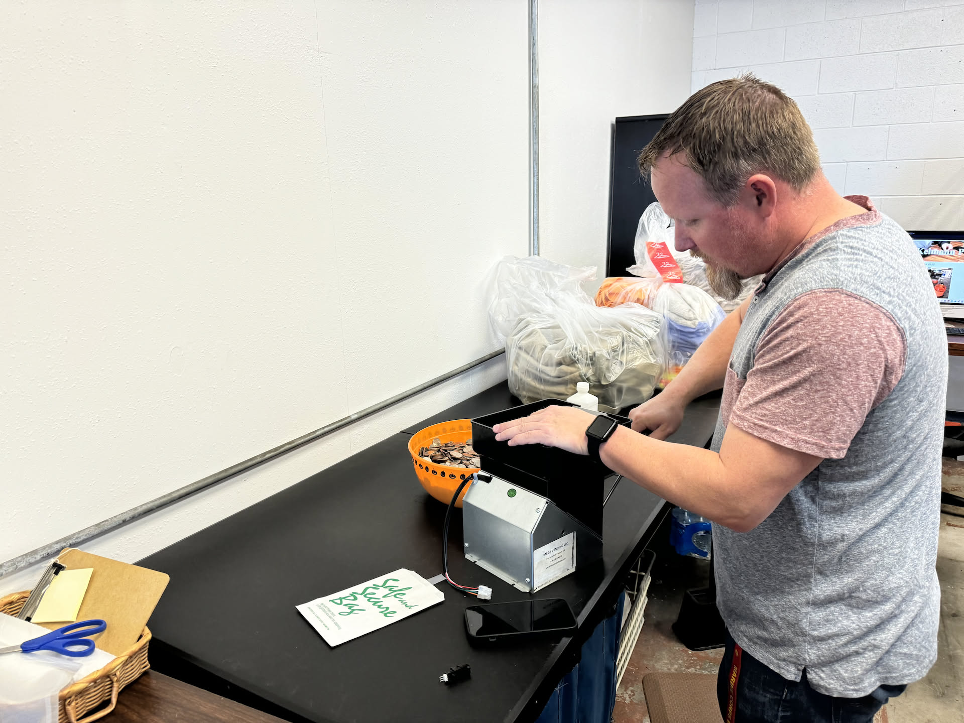 When Nick got back from deliveries – he found out that the change machine was giving away quarters while he was gone. Nick went ahead and took apart the machine and replaced it with a new sensor that he bought a couple weeks ago since the stupid thing keeps going down. So far it seems to be working great.