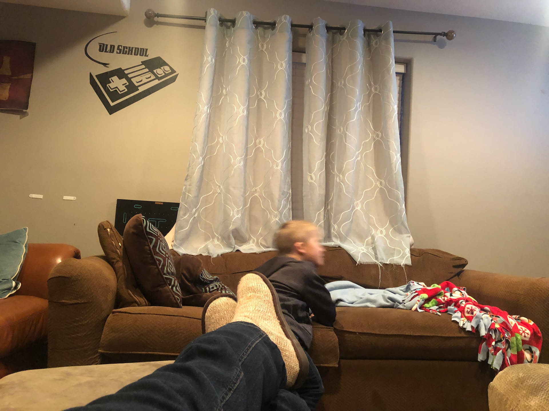 Relaxing on the couch while watching Ethan be crazy while he watches tv