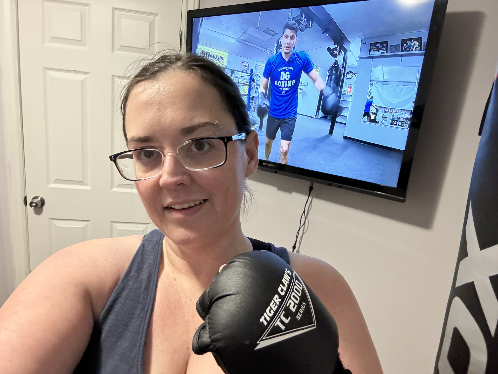 Deanna needing some therapy, she went down and worked out in our mini-gym focusing on the heavy bag.