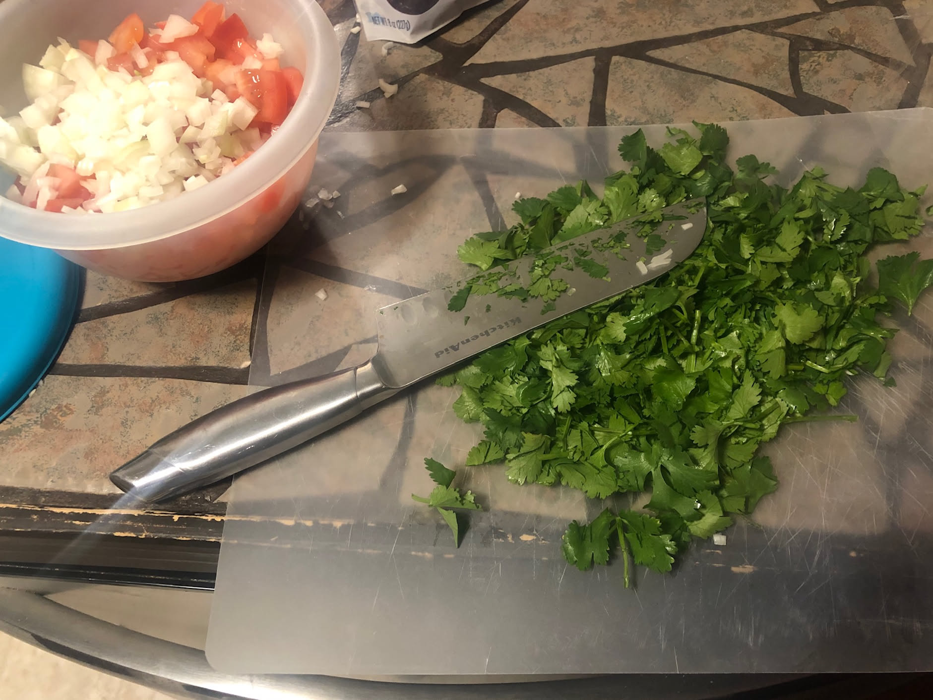 Deanna making some pico for dip.