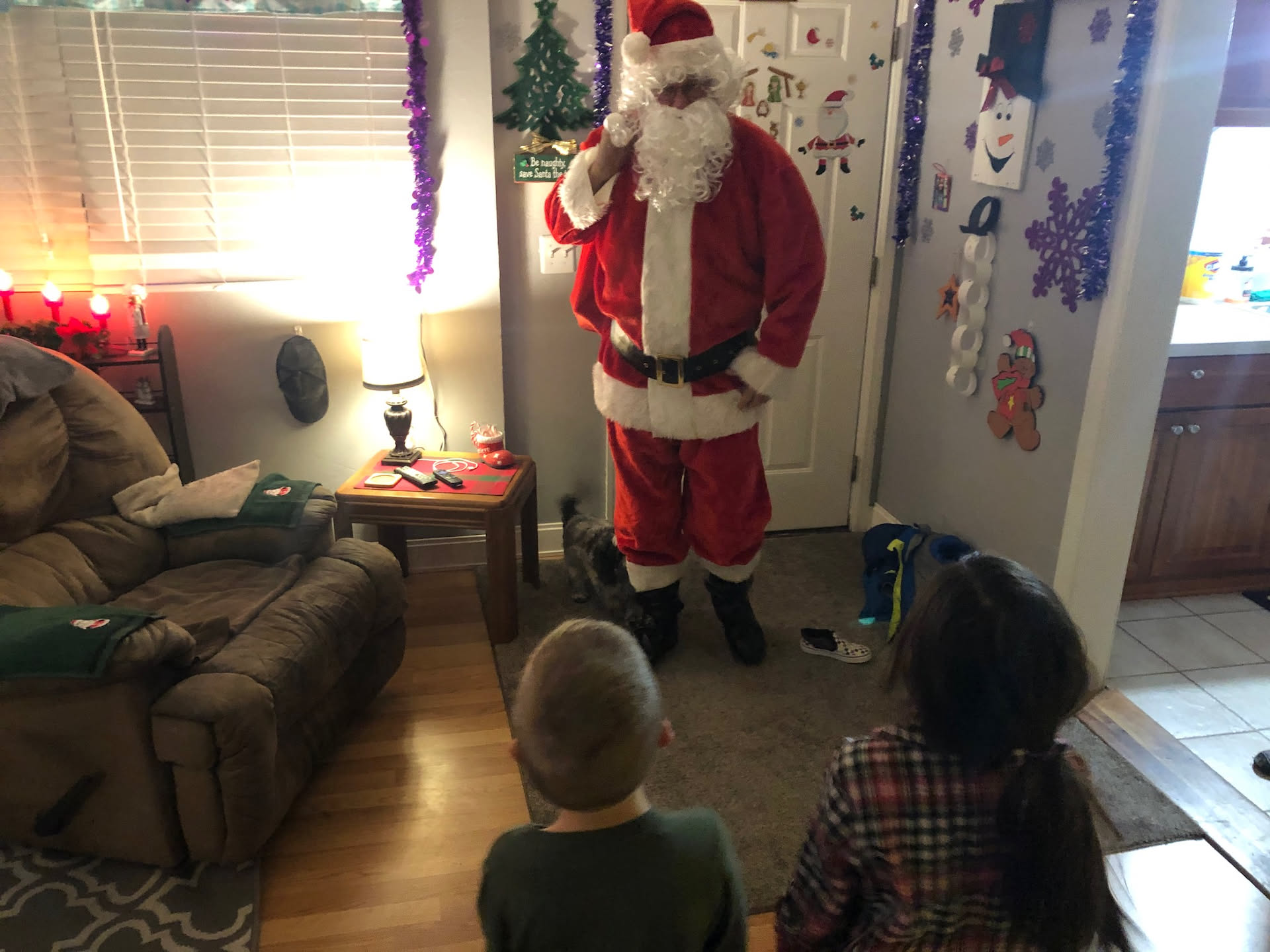 Santa greeting them.