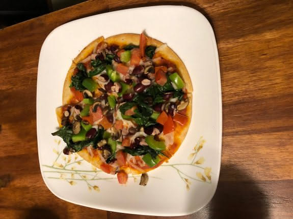 Deanna’s pizza is done and she is ready to relax!