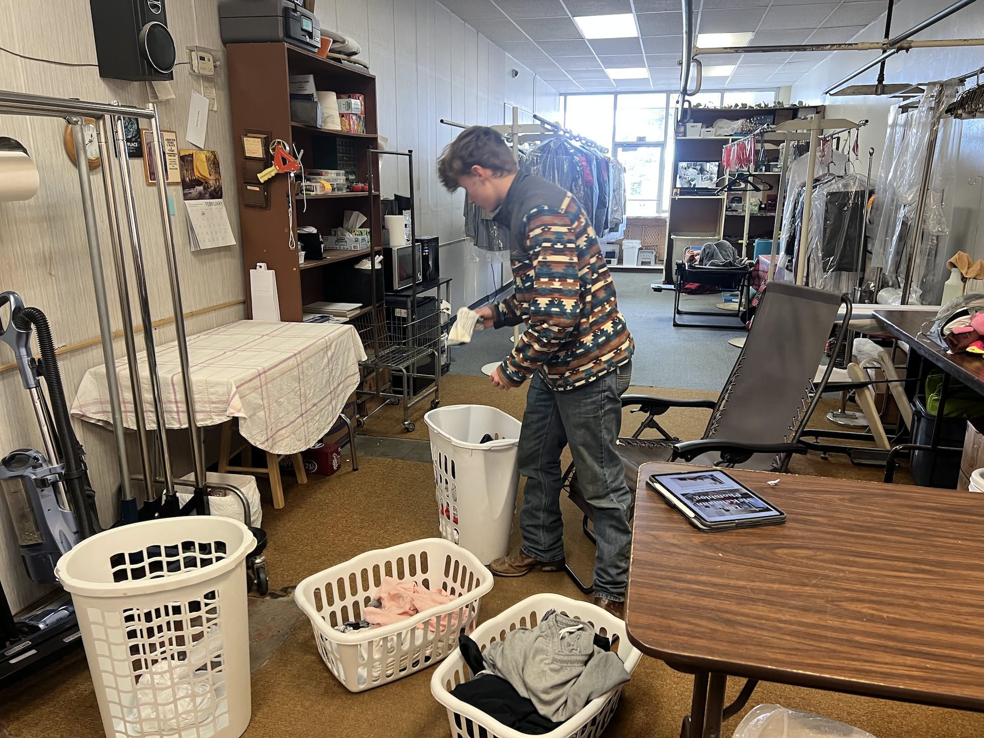 Avery has to do his laundry, so why not use our laundromat… and here he is sorting his laundry… teaching our kids the right way!