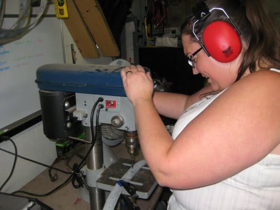 Deanna is working on a project turning barrel rings into a pumpkin.