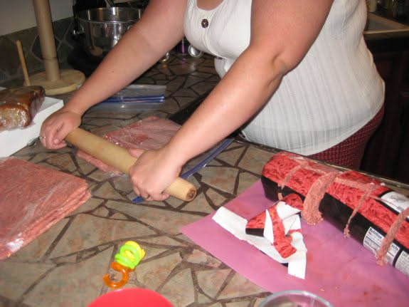 Finishing the evening out with portioning out the huge meat log we got.